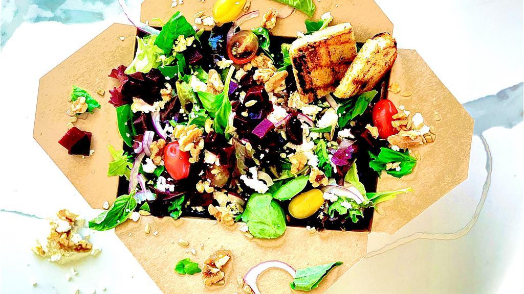 Farmers Salad with Balsamic Dressing · **Balsamic Dressing: Vegan, Keto, Gluten Free**
Organic mixed greens, beets, chevre goat cheese, cherry tomatoes, red onion, sunflower seeds, walnuts, basil