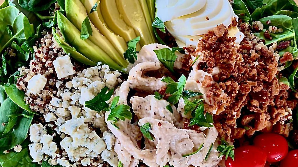 Quinoa Cobb bowl with Blue Cheese Dressing · **Blue Cheese Dressing: Has Egg, Dairy, Keto, Gluten Free**
Organic house quinoa blend, spinach, bacon, blue cheese, egg, sous vide chicken, avocado, cherry tomatoes, parsley