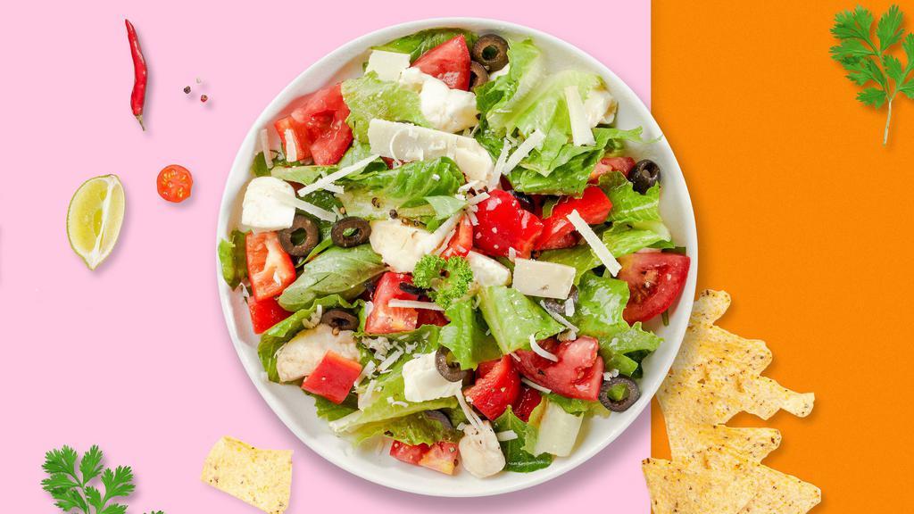 Margarita Salad · Made with fresh romaine lettuce, jicama, red and green cabbage, carrots, pinto beans, salsa fresca, and Mexican cheese with tangy lime vinaigrette.