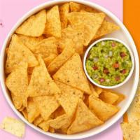 Holy Guacamole & Chips · A heaping scoop of fresh guacamole and warm tortilla chips