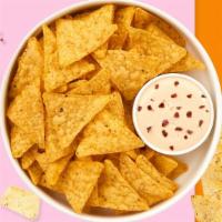 Queso Concerto · Muy Awesome melted cheese dip with warm tortilla chips