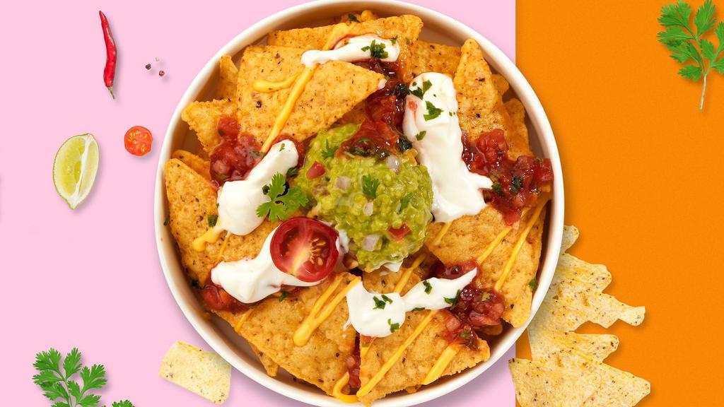 It's Nacho Problem · Warm nachos topped with salsa, guacamole, sour cream, and cheese.