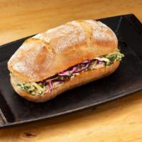 Classic Chicken Sandwich · White meat chicken with mixed cabbage slaw,  jalapeños, herb aioli, and Dijon mustard on an ...