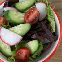 Small Green Salad · Mixed lettuces with cucumber, radish,  and tomatoes with choice of house dressing.