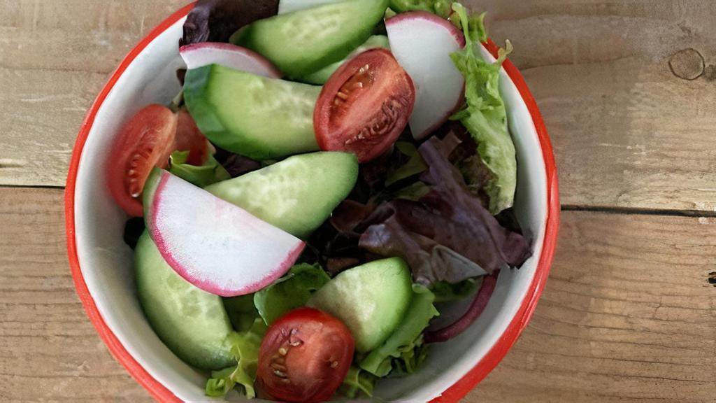 Small Green Salad · Mixed lettuces with cucumber, tomato, and radish with choice of house dressing.