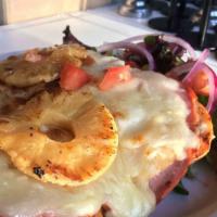 The Sorolla Sandwich · Ham, grilled pineapple, Jack cheese, roasted pepper mayo and tomatoes on Foccacia bread. Ser...