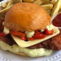 Italiano Fried Chicken Sandwich · Buttermilk fried chicken, roasted red peppers, pesto mayonnaise, Swiss cheese, and served on...