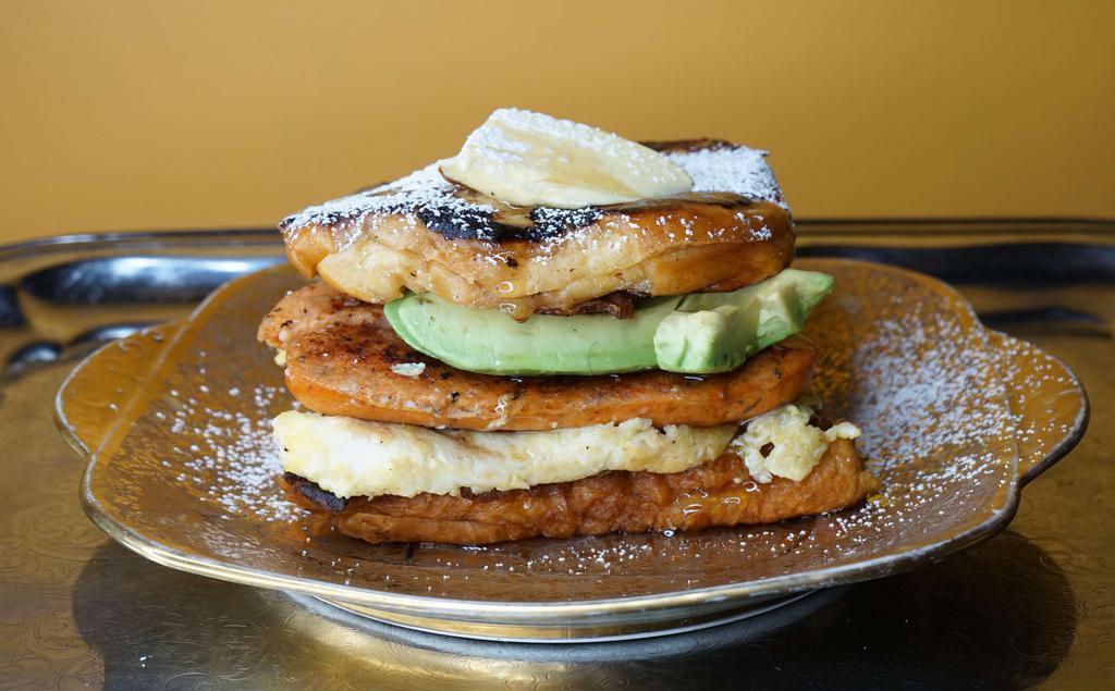 Sausage, Egg, Avocado, & Cheddar French Toast Sandwich · This one just got better with avocado. Served with butter and syrup.