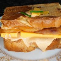 Caramelized Pear, Chipotle & Cheddar French Toast Sandwich · The sweetness of the pear and the sharpness of the Cheddar. You can eat it anytime. Served w...