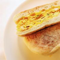Egg and Cheese Sandwich · 1 scrambled egg (red bell pepper, green onion, sriracha) and cheese with your choice of toas...
