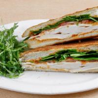 Chicken Panini · Oven-roasted chicken, mild homemade chipotle sauce, provolone cheese, fresh spinach, sliced ...