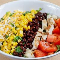 Southwest Salad · Seasonal greens, corn, black beans, tomatoes, shredded cheese, choice of protein