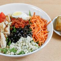 Cobb Salad · Seasonal greens,  bacon, eggs, blue cheese, tomatoes, carrots, black olives, choice of protein