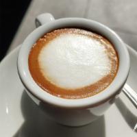 Espresso Macchiato · Double shot medium roast topped with foam.

Not a caramel macchiato.