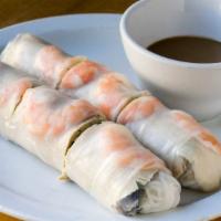 Spring Rolls · Poached pork and shrimp, vermicelli, mint, and peanut dipping sauce.