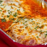 Chicken Parmigiana · Home-Style breaded chicken baked with marinara sauce & top with melted whole milk mozzarella...
