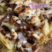 Penne Breadbowl Chicken Carbonara · Grilled chicken breast, smoked bacon, fresh onions and fresh mushrooms mixed with penne past...