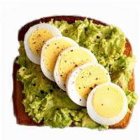 Avocado Toast · One whole fresh avocado mixed with diced cucumber and topped with a sliced hard-boiled egg. ...