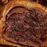 Cacao & Butter Toast · Toast topped with Cacao powder, Cacao Nibs, and butter of your choice.