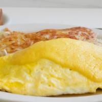 Garden Omelet · Loaded with spinach, mushroom, green pepper, onions, potatoes, & cheddar cheese topped with ...