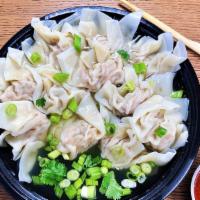 #11 Wonton Soup with Rice Noodles （馄饨鸡汤粉） · Savory pork wontons with rice noodles in our hearty, housemade chicken broth