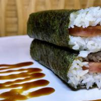 Spam Musubi (2pc) · Grilled spam with sweet teriyaki sauce on a bed of Jasmine rice wrapped in seaweed.