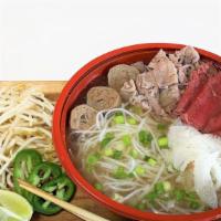#1 Special Combo (特别牛肉粉)  · Slices of medium rare steak, well-done brisket, tripe, and beef balls with Vietnamese rice s...