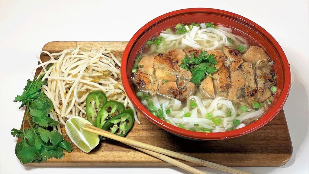 #7 Grilled Chicken and Rice Noodles (烧鸡粉) · Juicy, grilled chicken with rice noodles in our hearty, housemade chicken broth.