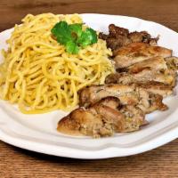 Grilled Chicken Garlic Noodles · Grilled, house-marinated chicken served with buttery garlic noodles.