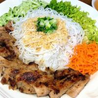 Grilled Chicken Vermicelli · Grilled, house-marinated chicken on a bed of vermicelli noodles and sliced vegetables. Serve...