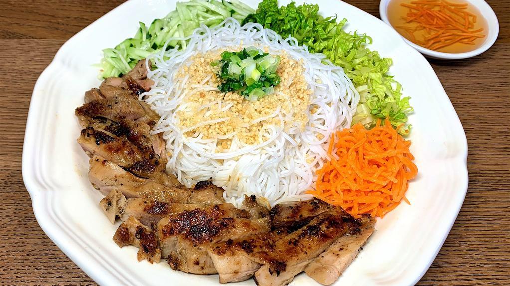 Grilled Chicken Vermicelli · Grilled, house-marinated chicken on a bed of vermicelli noodles and sliced vegetables. Served with Vietnamese fish sauce and crushed peanuts (unless specified elsewise in the comments).