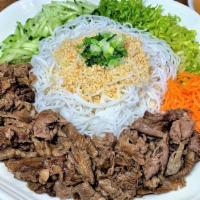 Grilled Beef Vermicelli · Grilled, house-marinated beef on a bed of vermicelli noodles and sliced vegetables. Served w...