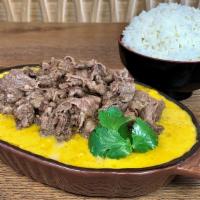 Curry Beef and Rice · Marinated, grilled beef with our housemade curry cooked from a chicken broth base. Served on...