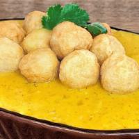 Curry Fishballs · Deep fried fishballs with our homemade curry cooked from a chicken broth base