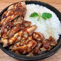Teriyaki Chicken Bowl · Grilled, house-marinated teriyaki chicken served on a bed of Jasmine rice.
