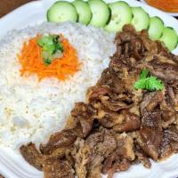 Grilled Pork Bento Box · A dinner-sized Bento Box of grilled, house-marinated pork with fresh vegetables served with ...