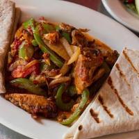 Fajitas with Tortillas · Served with sauteed bell peppers, onions, guacamole, and sour cream.