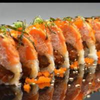 Flame Roll · Spicy tuna roll topped with imitation crab meat salmon and tobiko