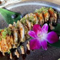 Deep Fried Dynamite Roll · Deep fried mixed fish roll with special sauce