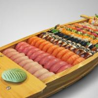 Sushi Boat · 9 pcs hamachi nigiri, 10 pcs maguro nigiri, 11 pcs sake nigiri, 12 pcs unagi nigiri, 1 drago...