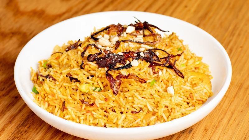 Nepali Goat Biryani · Vegetarian. Gluten free. Basmati Rice flavored with Homemade fragrant Biryani spices with slow cooked tasty Bone in Goat