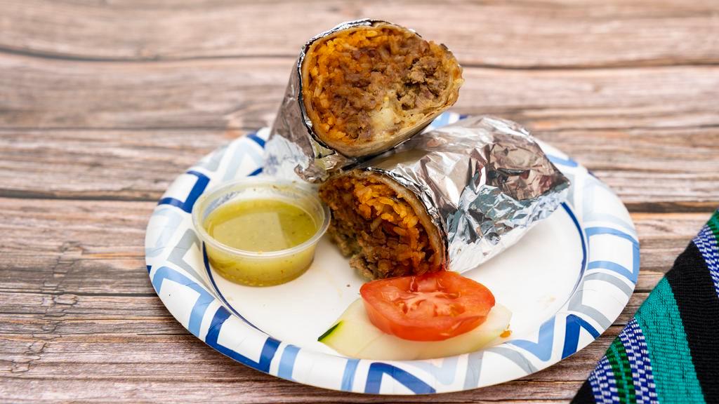 Super Burrito · Comes with the meat your choice steak, chicken, spicy pork, or carnitas rice, beans, cilantro onion, cheese, sour cream guacamole, and salsa.