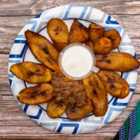 Platanos Con Crema (Plantain) · Sweet fried plantains served with black beans and sour cream.