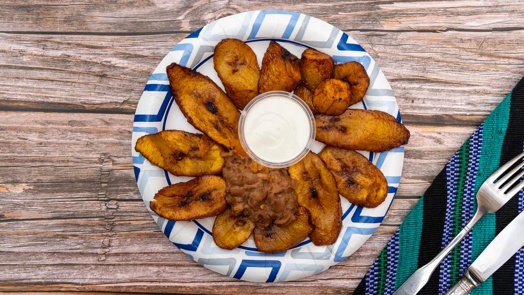 Platanos Con Crema (Plantain) · Sweet fried plantains served with black beans and sour cream.