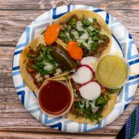 Tacos · Carne asada, al pastor, pollo asado, lengua, or cabeza carnitas.