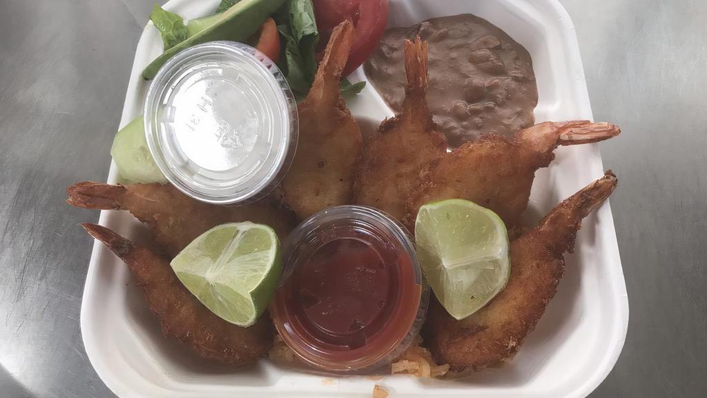 Camarones Empanizados · Breaded shrimp served with rice, beans and salad and a side of ranch dressing.