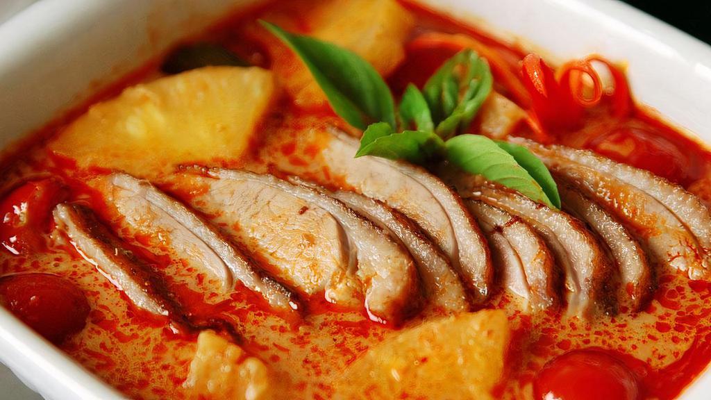 Roasted Duck Curry · Red duck curry with pineapple and lychees. Sweet pineapple and lychees help temper the heat of this fiery red duck curry.