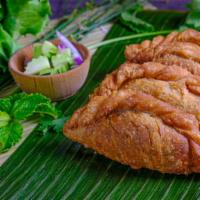 Samosa - กะหรี่ปั๊ป · Deep-Fried Pastry filled with Potato, Carrot, and Onion served with Cucumber Salad.