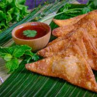Crispy Larb Wonton เกี๊ยวลาบกรอบ · Deep fried thai spice (larb) pork wontons with sweet chili sauce.