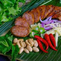 Chiang Mai Style Thai Herb Sausage ไส้อั่ว · Northern style pork sausage.
